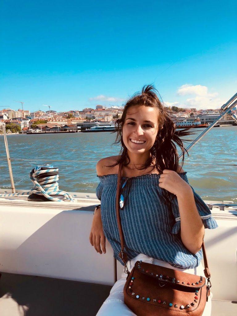Amanda posing on a boat.